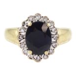 9ct gold oval cut sapphire and round brilliant cut diamond cluster ring