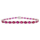 18ct white gold oval ruby and round brilliant cut diamond bracelet