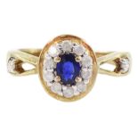 9ct gold oval cut sapphire and round brilliant cut diamond cluster ring