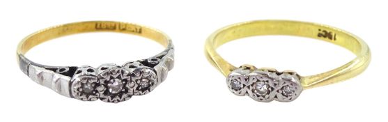 Two early - mid 20th century 18ct gold and platinum three stone diamond chip rings