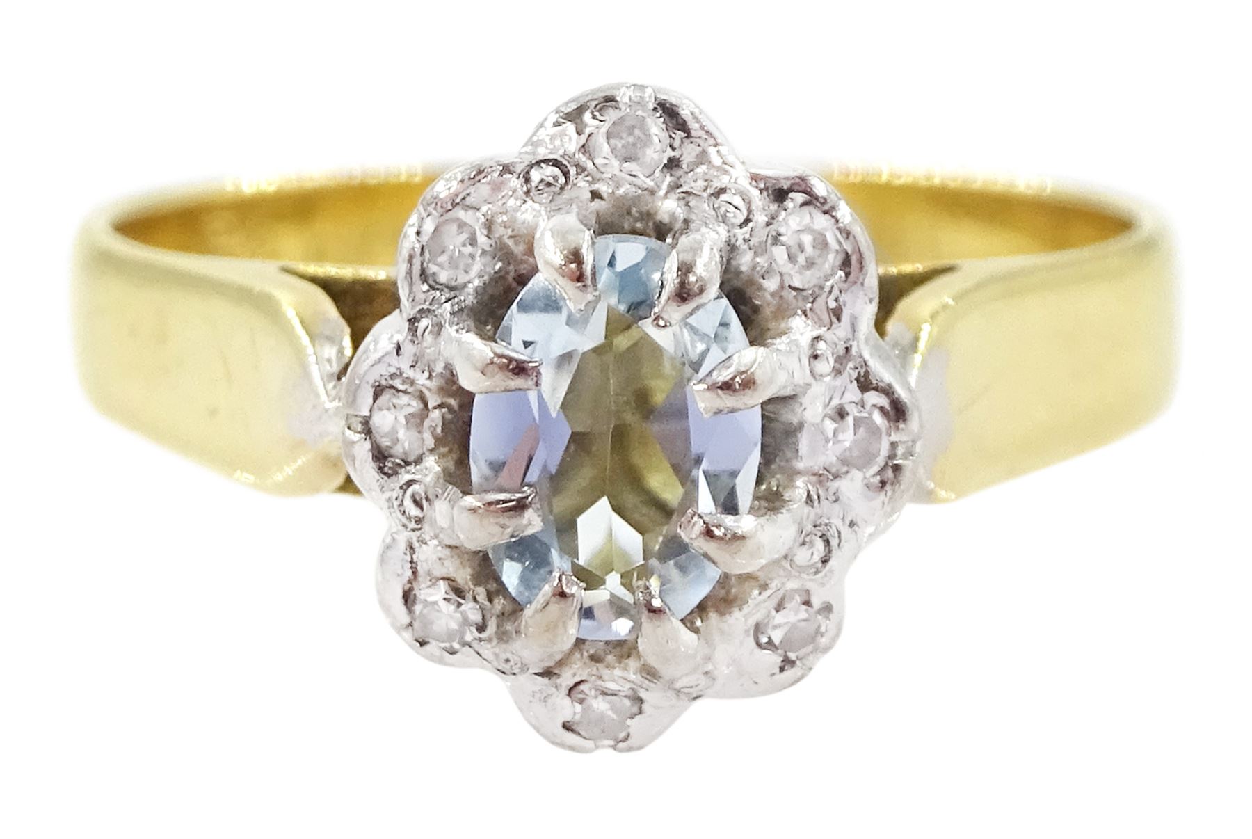 18ct gold oval cut aquamarine and round brilliant cut diamond cluster ring