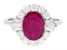 18ct white gold oval cut ruby and round brilliant cut diamond cluster ring