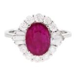 18ct white gold oval cut ruby and round brilliant cut diamond cluster ring