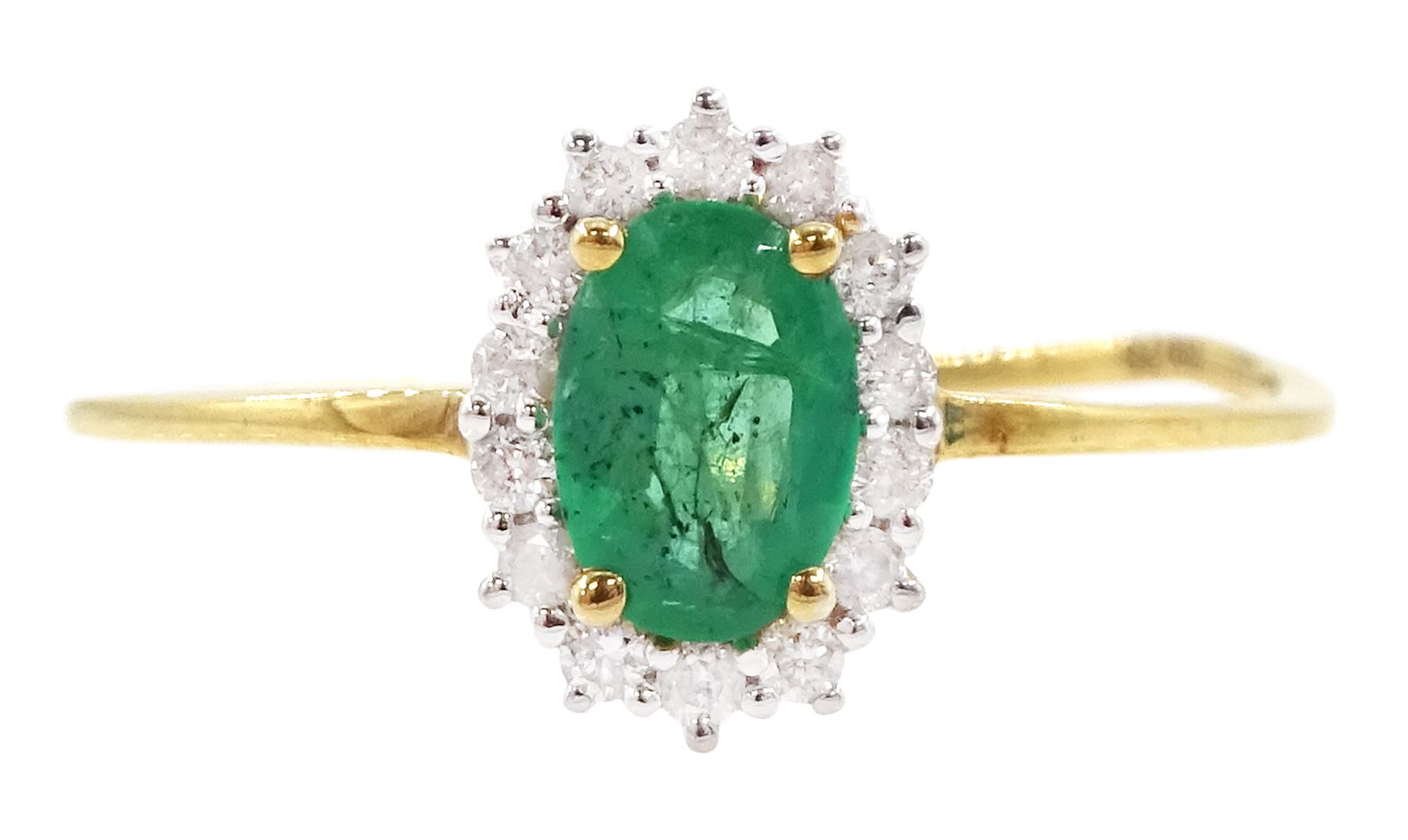 18ct gold oval cut emerald and round brilliant cut diamond cluster ring