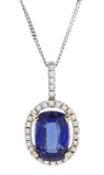 18ct white gold rectangular cushion cut sapphire and round brilliant cut diamond halo cluster pendan