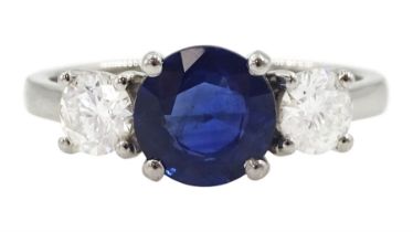 Platinum three stone sapphire and round brilliant cut diamond ring