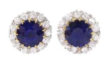 Pair of gold and platinum sapphire and diamond circular cluster stud earrings