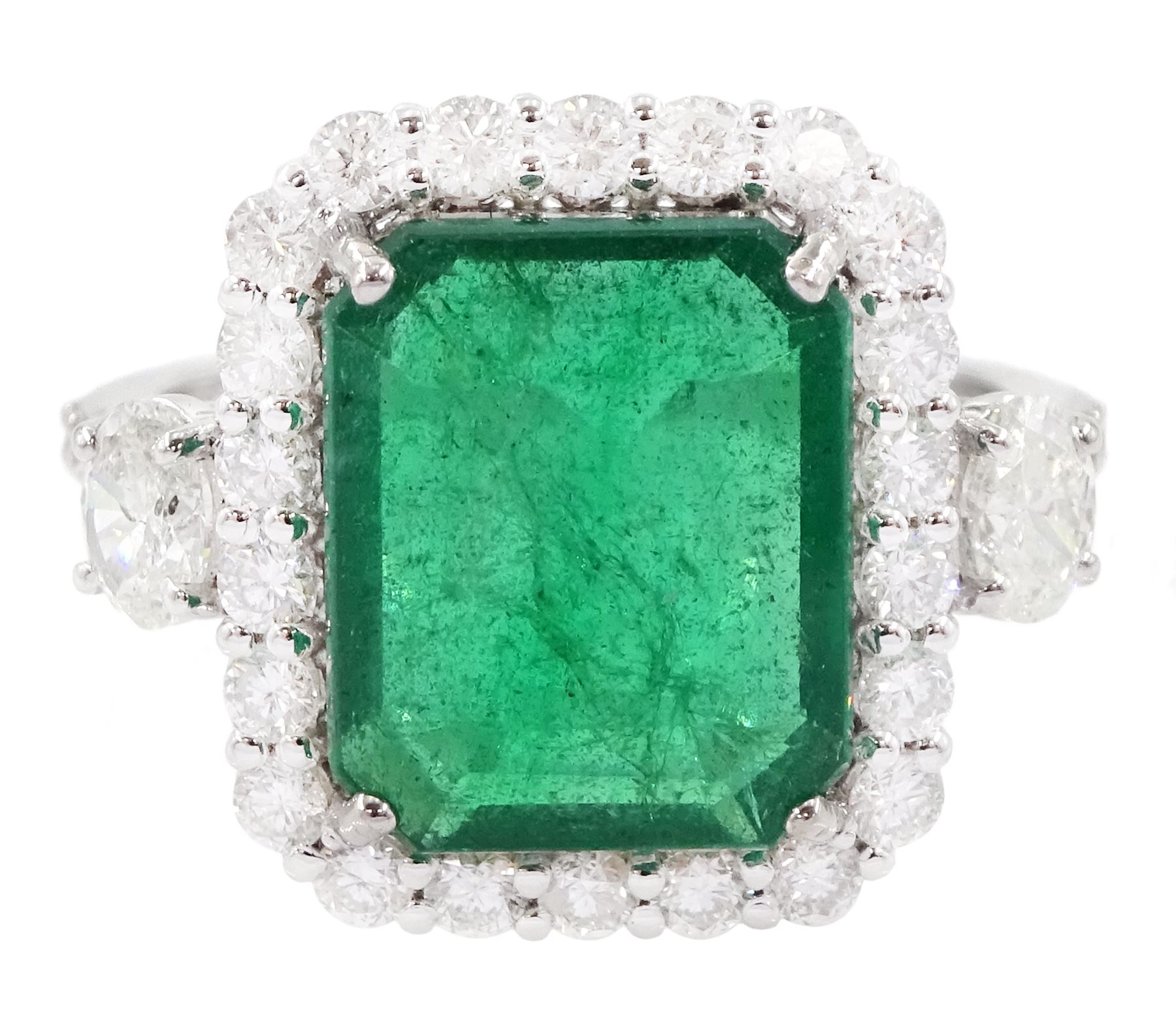 18ct white gold emerald and round brilliant cut diamond cluster ring