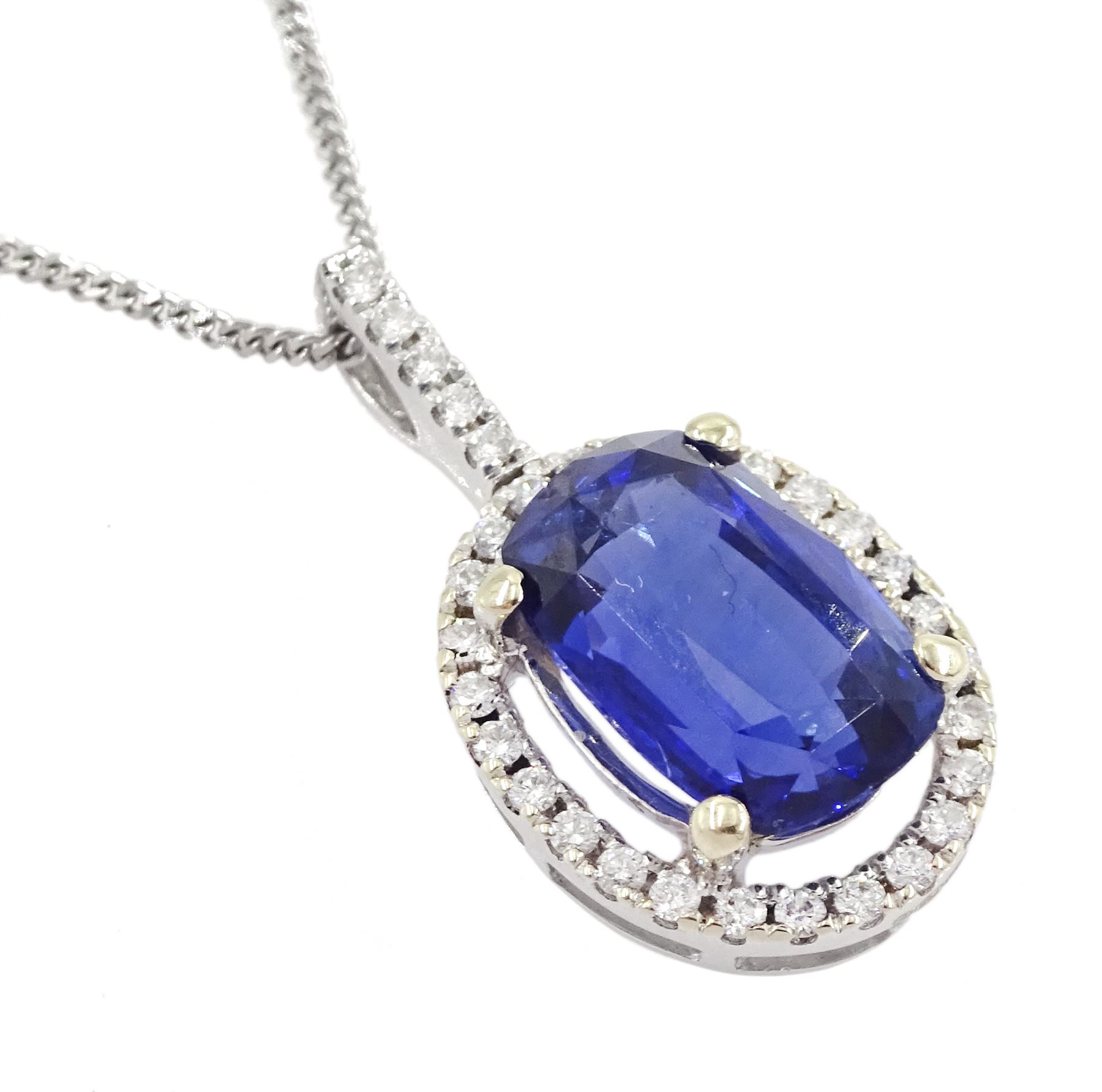 18ct white gold rectangular cushion cut sapphire and round brilliant cut diamond halo cluster pendan - Image 2 of 4