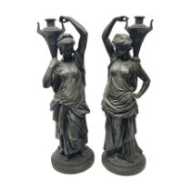 Pair of bronzed female figures