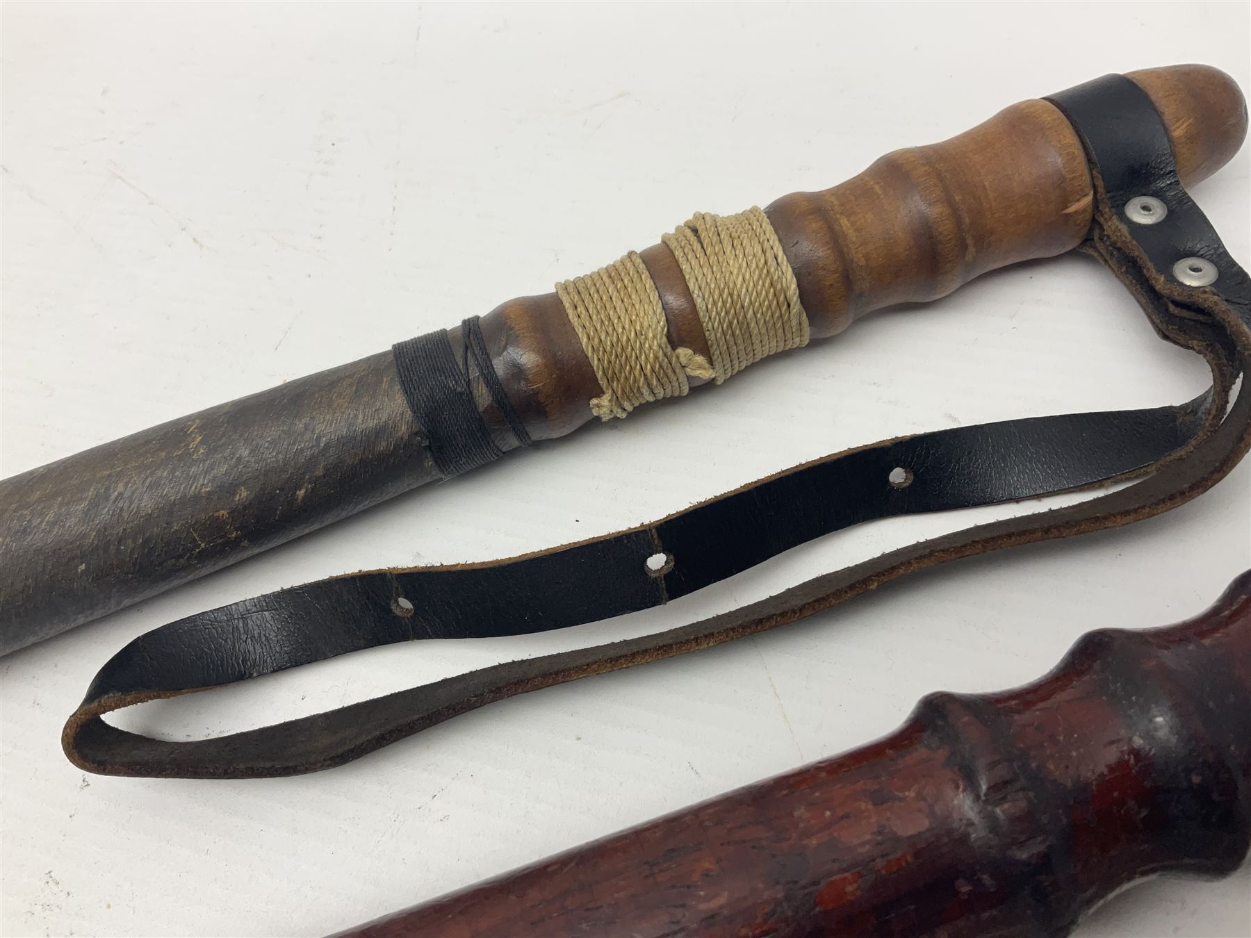 Two wooden truncheon with turned grips and leather straps - Image 7 of 14
