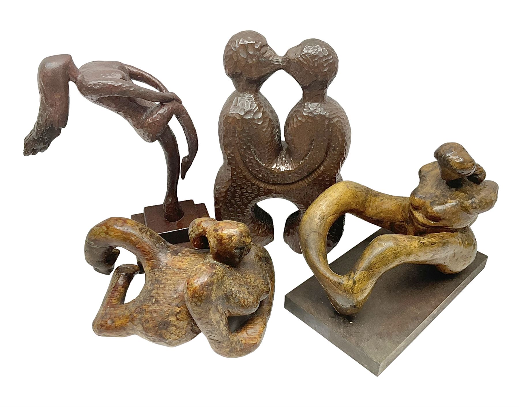 Helen Skelton (British 1933 – 2023): Four carved wooden abstract sculptures