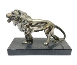 Silvered metal lion