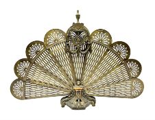 Pierced brass peacock style folding fire screen