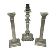 Pair of Corinthian column candlesticks