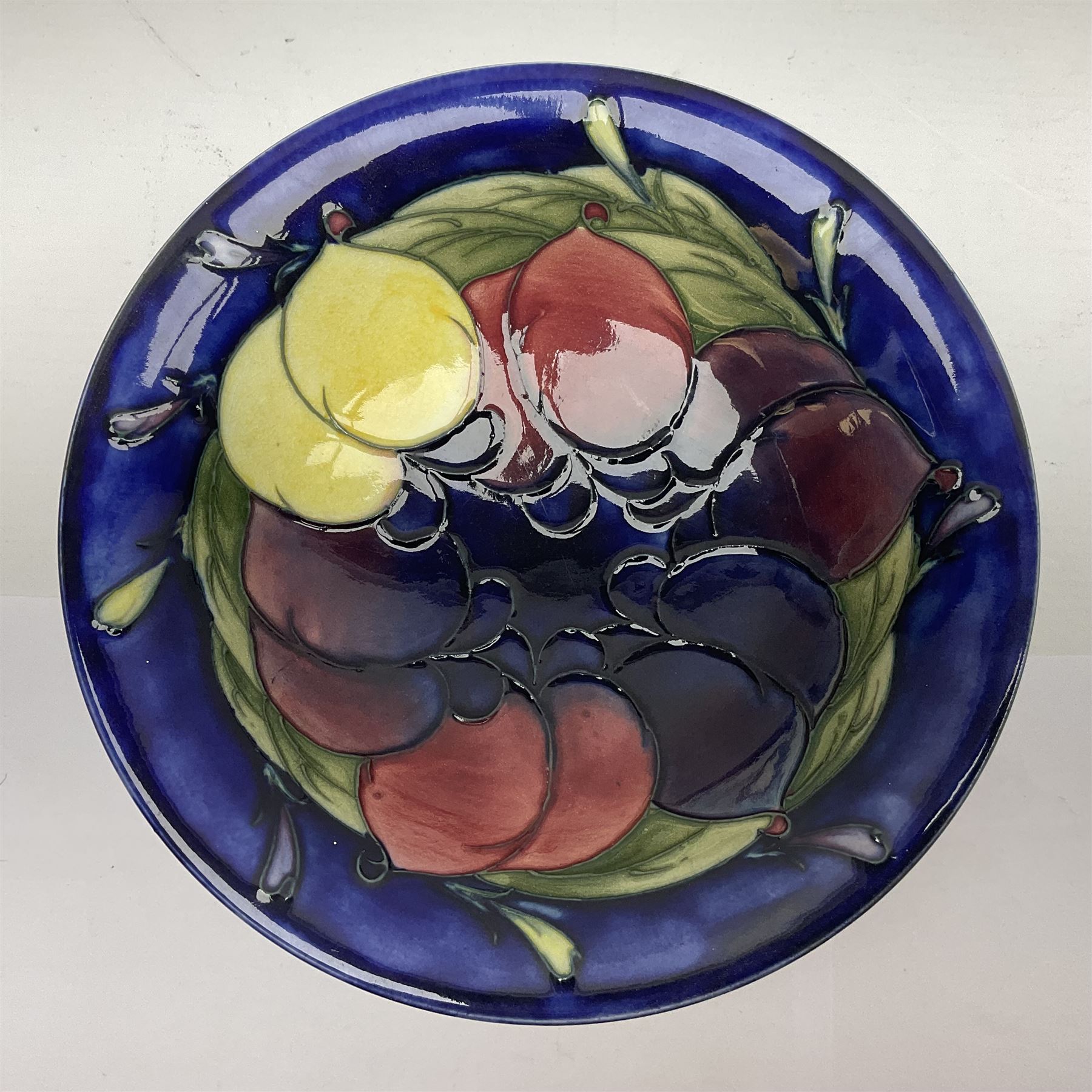 Moorcroft small pedestal dish decorated in the Wisteria pattern against a dark blue ground raised to - Image 2 of 8