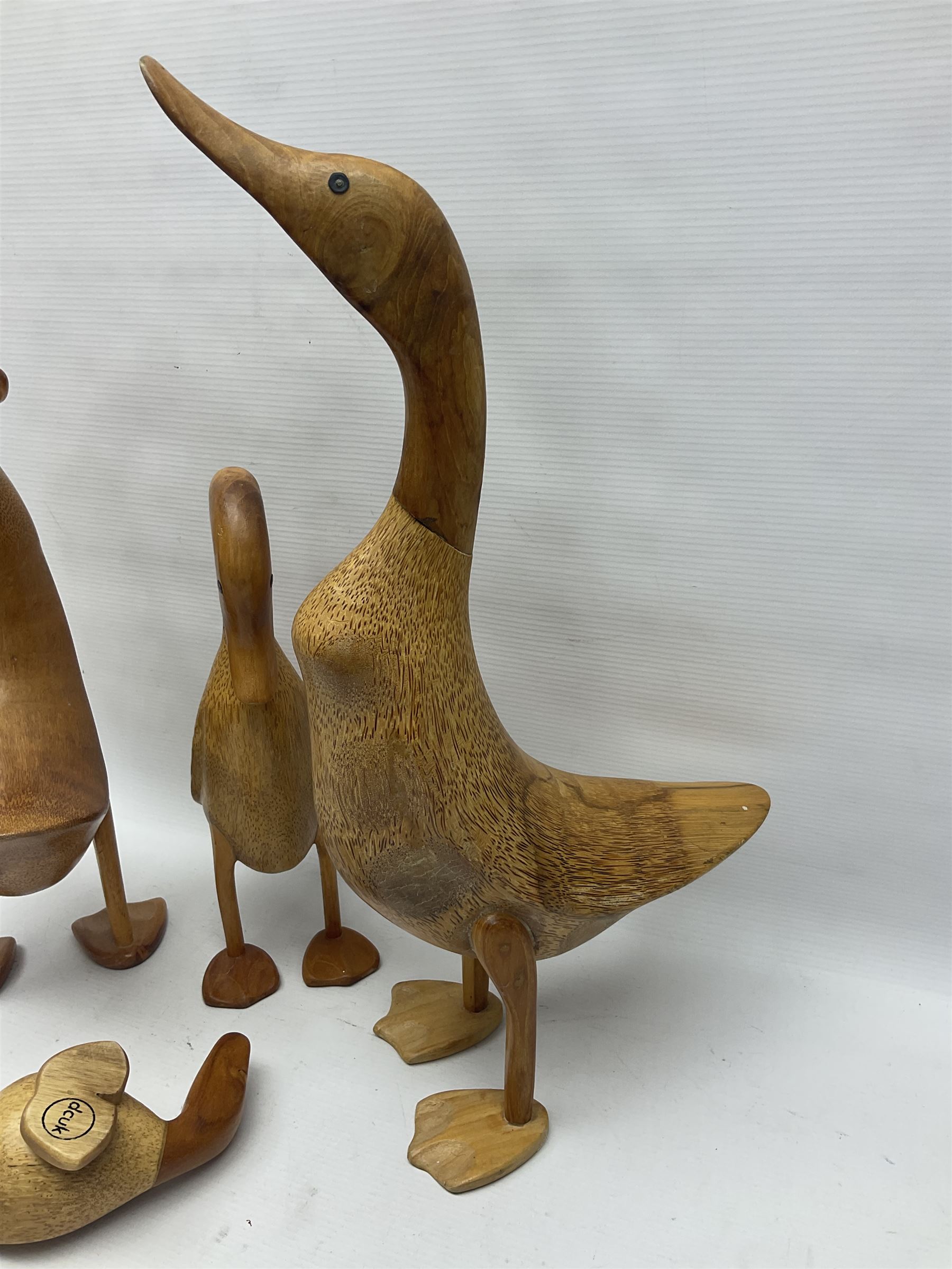 Four carved fruit wood ducks by Dcuk of various sizes - Image 5 of 14