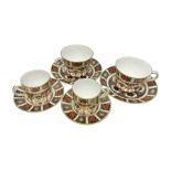 Royal Crown Derby 1128 Imari pattern two coffee cans and saucers