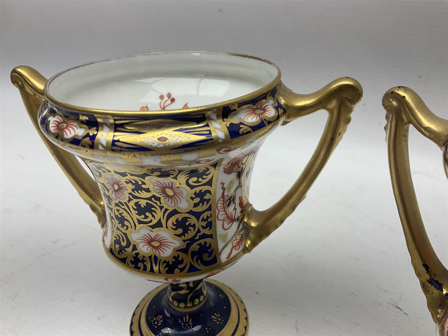 Pair of Royal Crown Derby 6299 Imari pattern twin handled trophy vases - Image 6 of 11