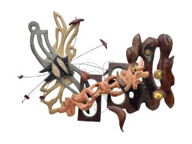 Helen Skelton (British 1933 – 2023): Three carved wooden and metal abstract wall sculptures