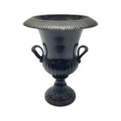 Bronze twin handled urn with fluted rim with gadrooned detailing