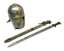 Re-enactors Viking helmet and sword in scabbard