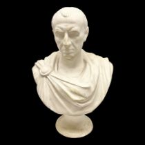Composite bust of a classical figure of the Roman Julius Caesar being raised on a socle plinth