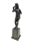 Bronze nude female figure holding a rose