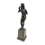 Bronze nude female figure holding a rose