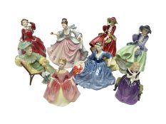 Eight Royal Doulton figures