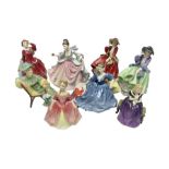 Eight Royal Doulton figures