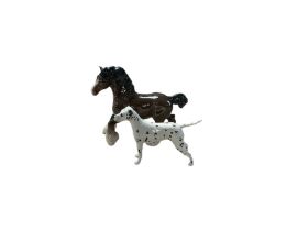 Beswick dalmatian together with a bay horse