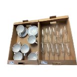 Six coffee cups and saucers together with a group of champagne flutes