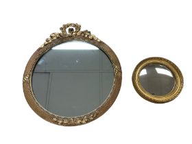 Early 20th century circular wall mirror in giltwood frame with gesso laurel wreath pediment dia.41cm