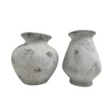 Two composite Grecian design urns or pots