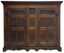 Large 18th century and later oak livery cupboard