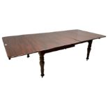 19th century mahogany extending dining table with three additional leaves