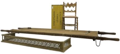 Wooden and canvas stretcher; 'Stocktaking Stores Completed' painted wooden sign; late 19th century s