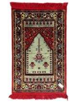 Turkish crimson and light blue ground prayer rug