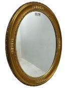 19th century design gilt framed oval wall mirror