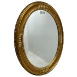 19th century design gilt framed oval wall mirror