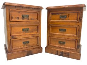 Pair of hardwood three drawer bedside chests