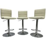 Three cream and chrome bar stools