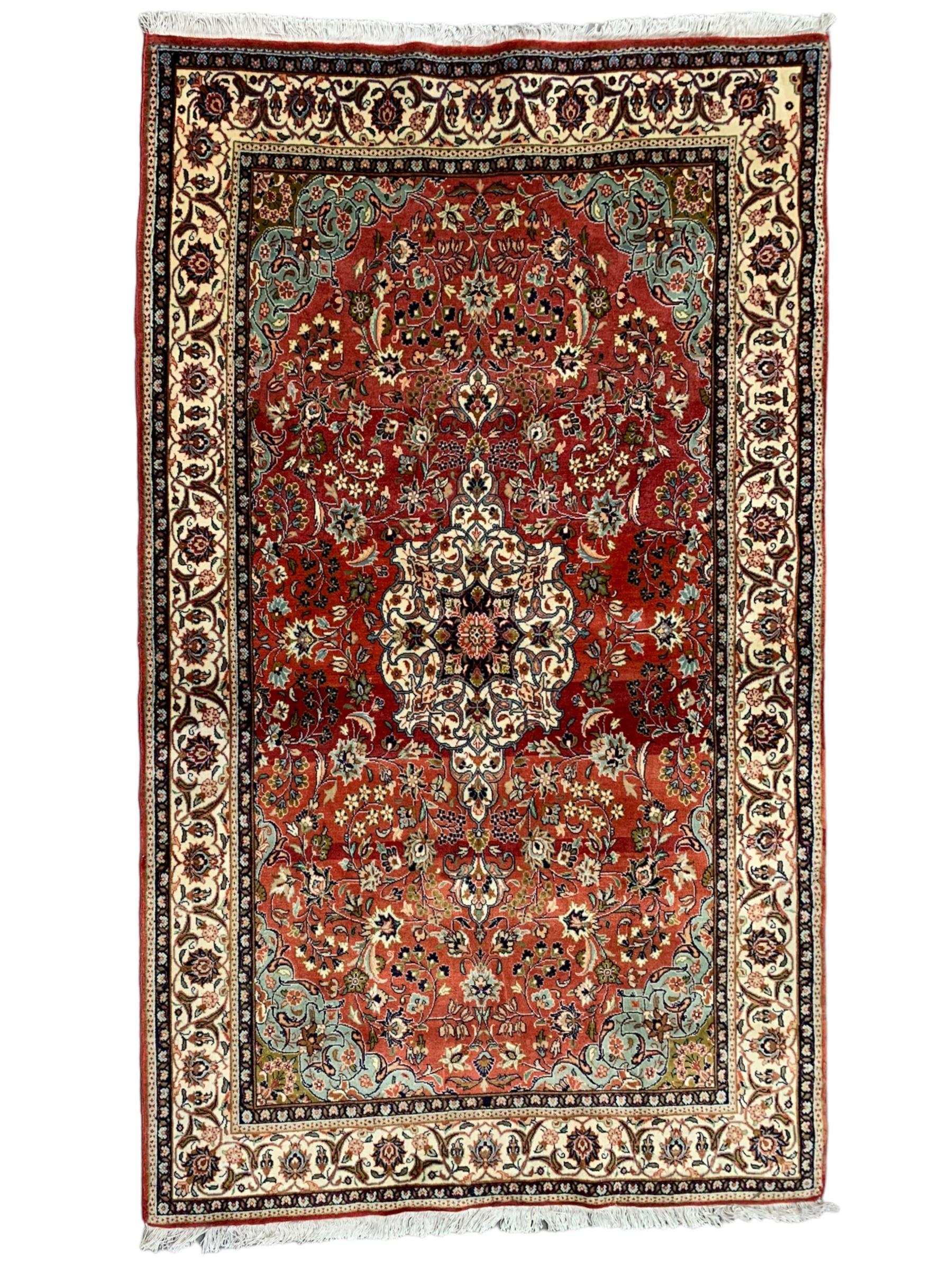 Small Persian Kashan crimson ground rug