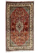Small Persian Kashan crimson ground rug