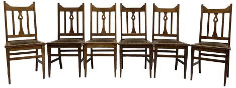 Set of six early 20th century oak dining chairs