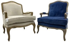 Near pair of French Louis XV design light oak framed bedroom armchairs