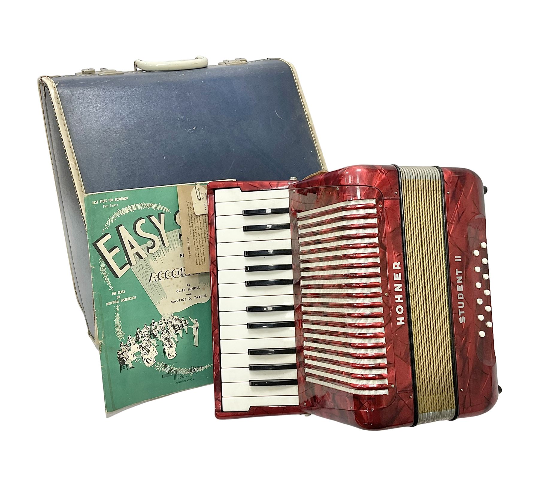 German Hohner student II compact accordion with 26 keys and 12 bass registers in a hard case With tu