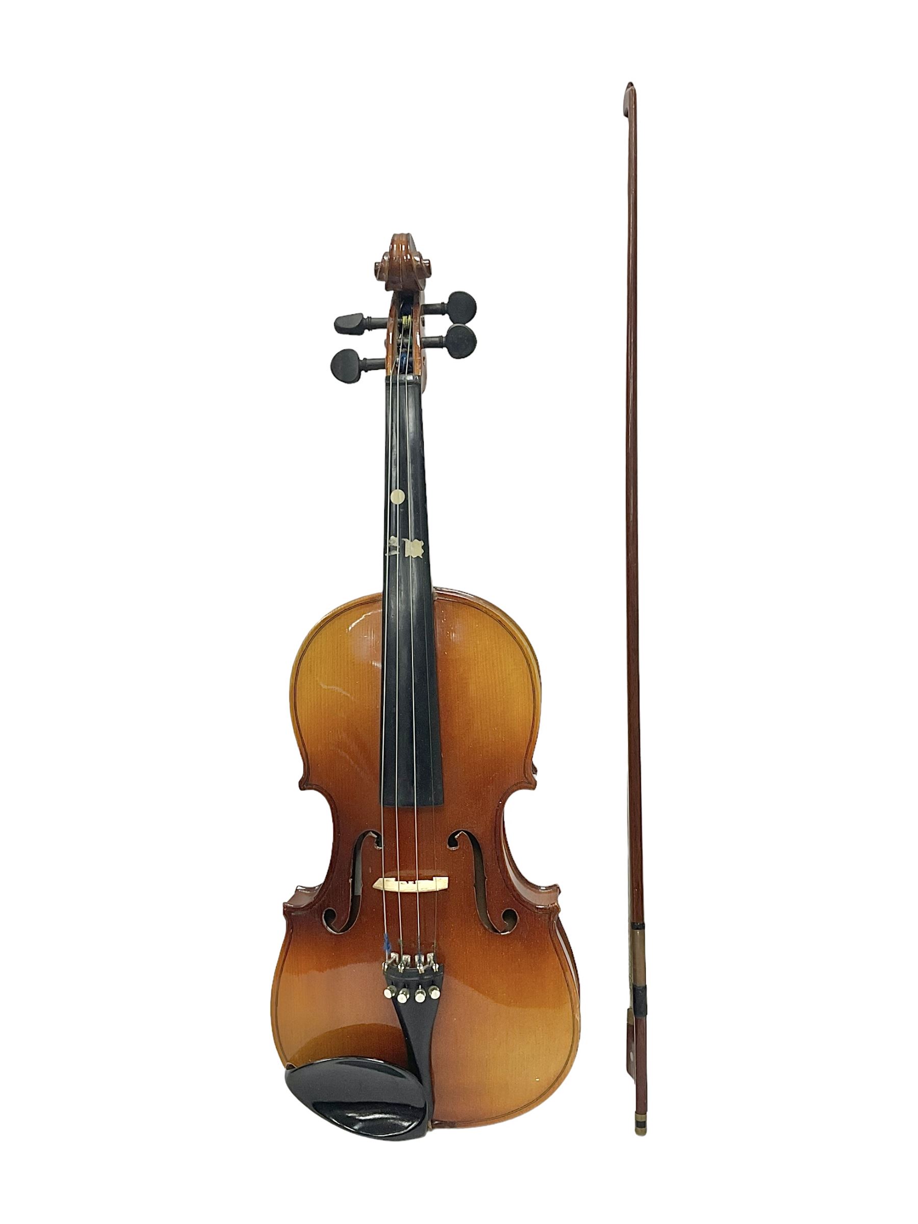 Full size violin with a maple back and ribs
