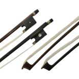 Two wooden violin bows